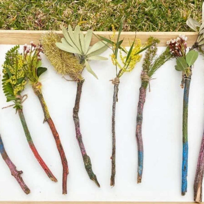 Handmade nature wands decorated with flowers, leaves and Kitpas Crayons