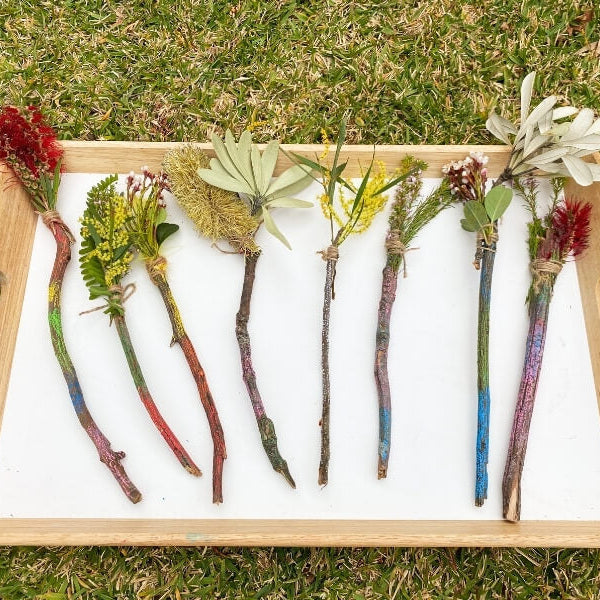 Handmade nature wands decorated with flowers, leaves and Kitpas Crayons