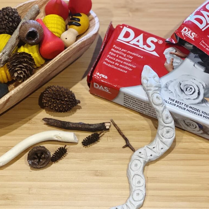 A hand-molded serpent sculpture made from DAS clay for NAIDOC Week.