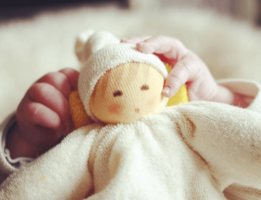 Nanchen Natur white baby's first doll and grasper