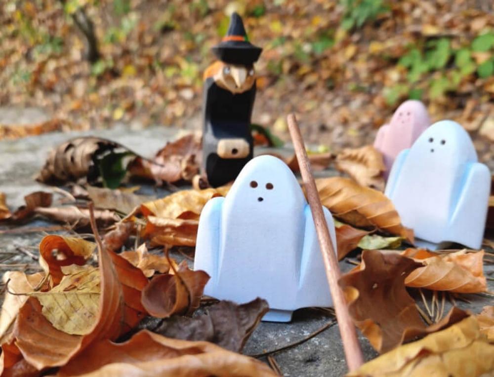 Bumbu Halloween themed ghosts and witch wooden figures in an outdoor play setting