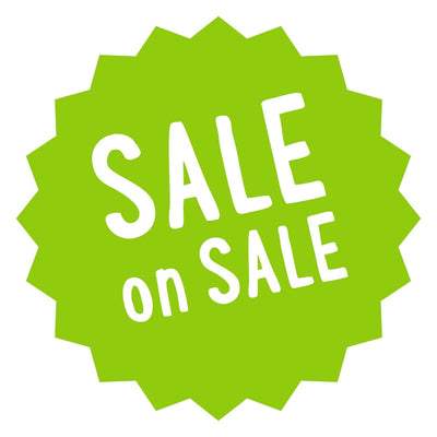 Green sale label with 'SALE on SALE' text on a white background