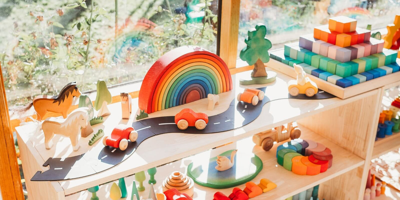 Wooden Playroom Shelf displaying open ended bestselling wooden toys from Oskar's Wooden Ark 