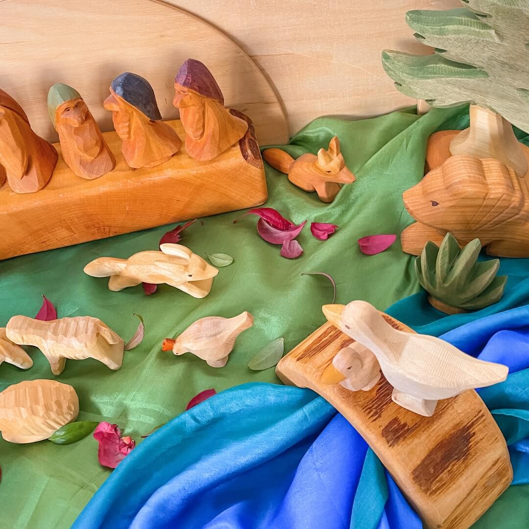 A Small World play scene with Predan Natural Wooden Animals from Oskar's Wooden Ark in Australia