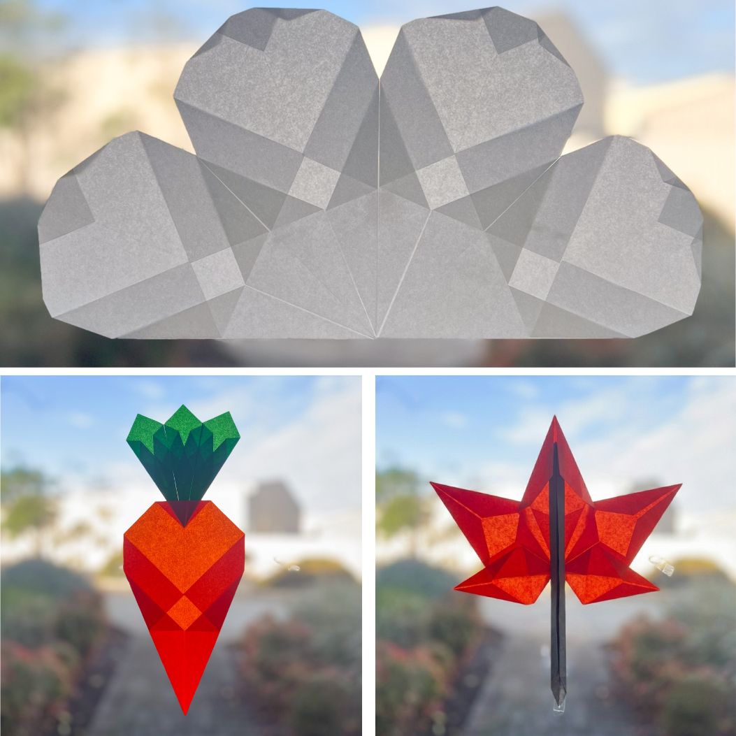 Three paper window crafts arranged on a window.