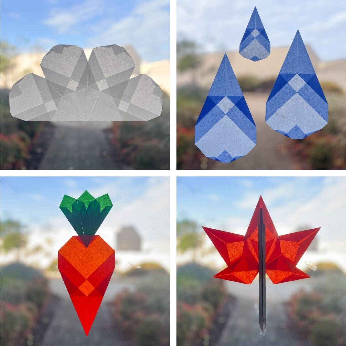 Four paper window designs displayed on a window pane.