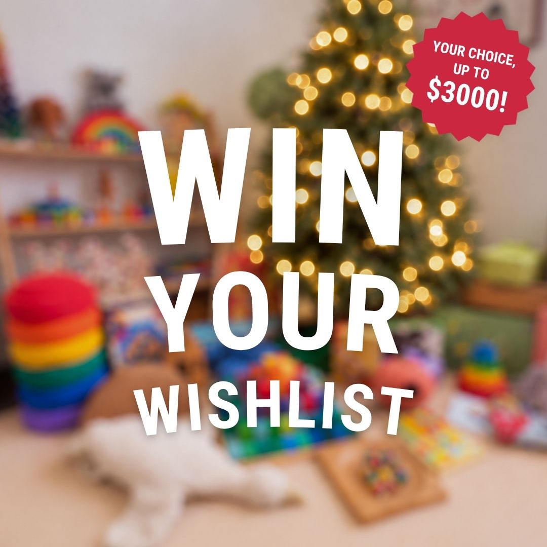 Blurred image of colourful children's gifts under a Christmas tree with the text: "Win Your Wishlist - Your Choice, up to $3000"