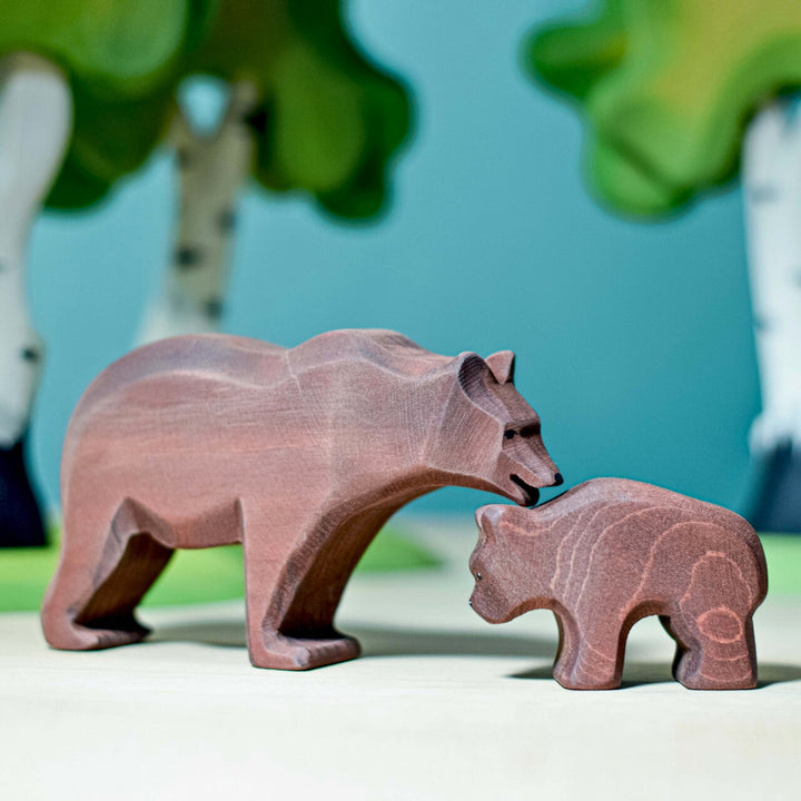 BumbuToys Handcrafted Wooden Animal Brown Bear Cub from Australia in a small-world play setting