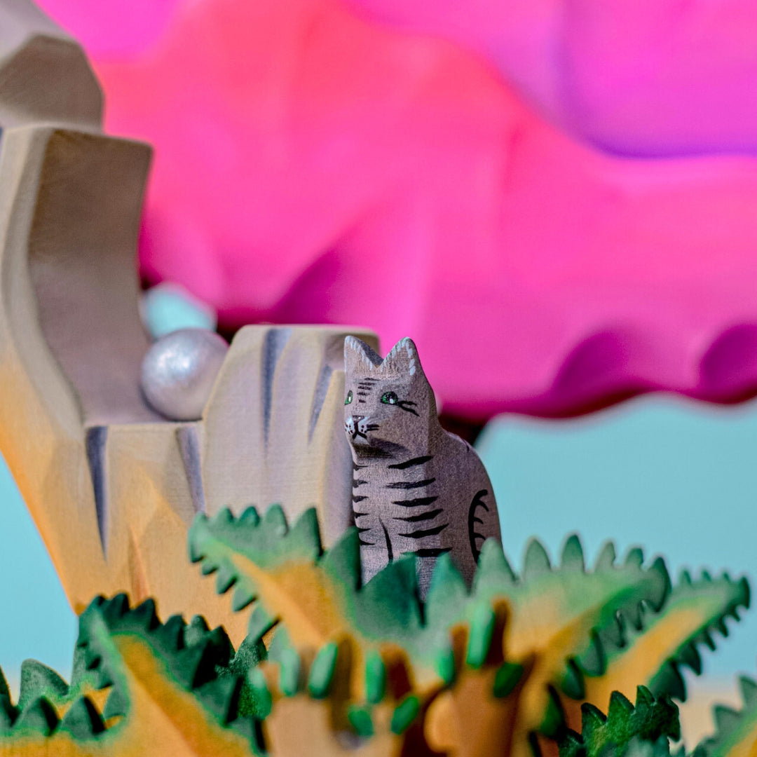 BumbuToys Handcrafted Wooden Cat from Australia in a small-world play setting