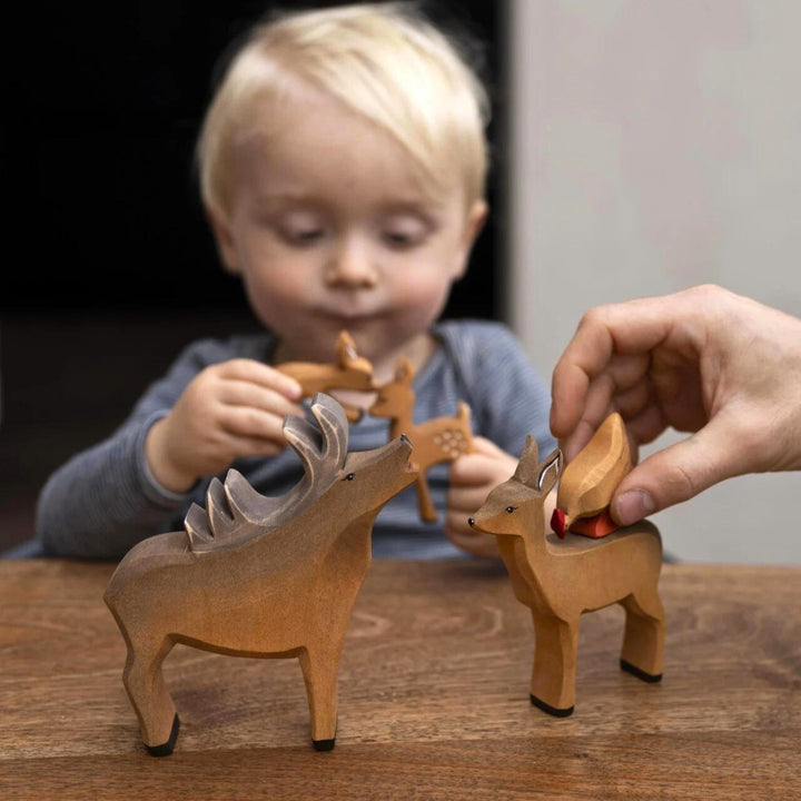 BumbuToys Handcrafted Wooden Animal Deer Stag from Australia in a small-world play setting