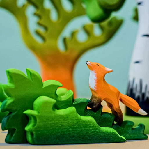 BumbuToys Handcrafted Wooden Animal Baby Fox Cub from Australia in a small-world play setting