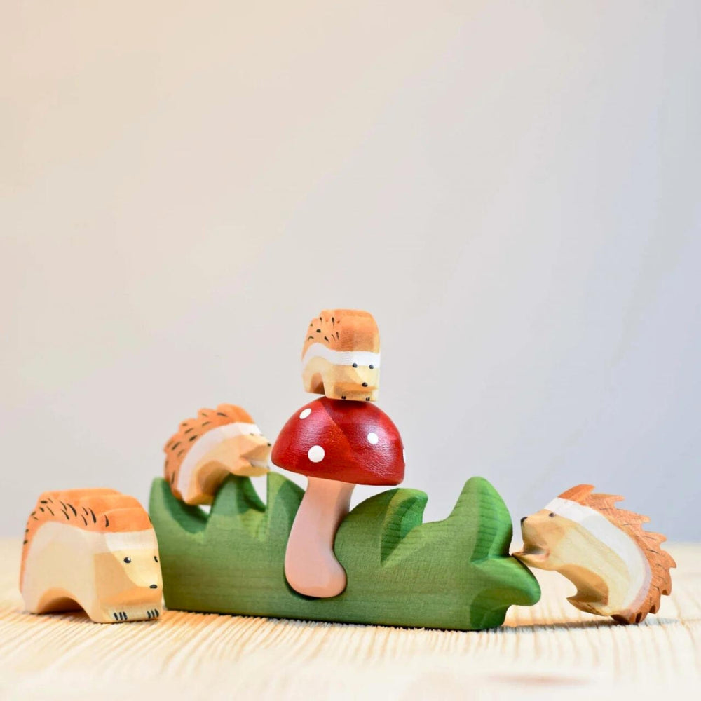 BumbuToys Handcrafted Wooden Animal Small Hedgehog from Australia in a small-world play setting