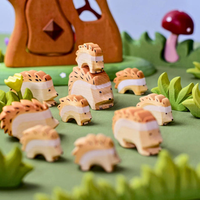 BumbuToys Handcrafted Wooden Animal Hedgehog from Australia in a small-world play setting