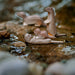 BumbuToys Handcrafted Wooden Animal Otter Standing from Australia in a small-world play setting