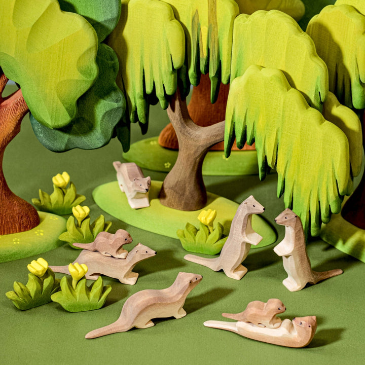 BumbuToys Handcrafted Wooden Animal Sleeping Otter from Australia in a small-world play setting