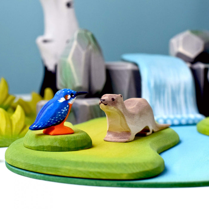 BumbuToys Handcrafted Wooden Animal Otter from Australia in a small-world play setting
