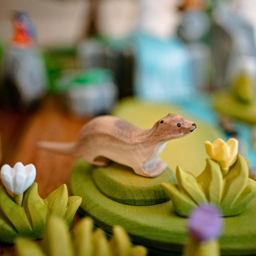 BumbuToys Handcrafted Wooden Animal Otter from Australia in a small-world play setting