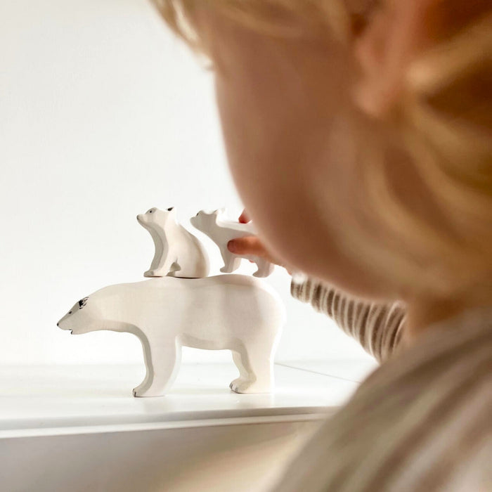 BumbuToys Handcrafted Wooden Animal Polar Bear Baby Sitting from Australia in a small-world play setting