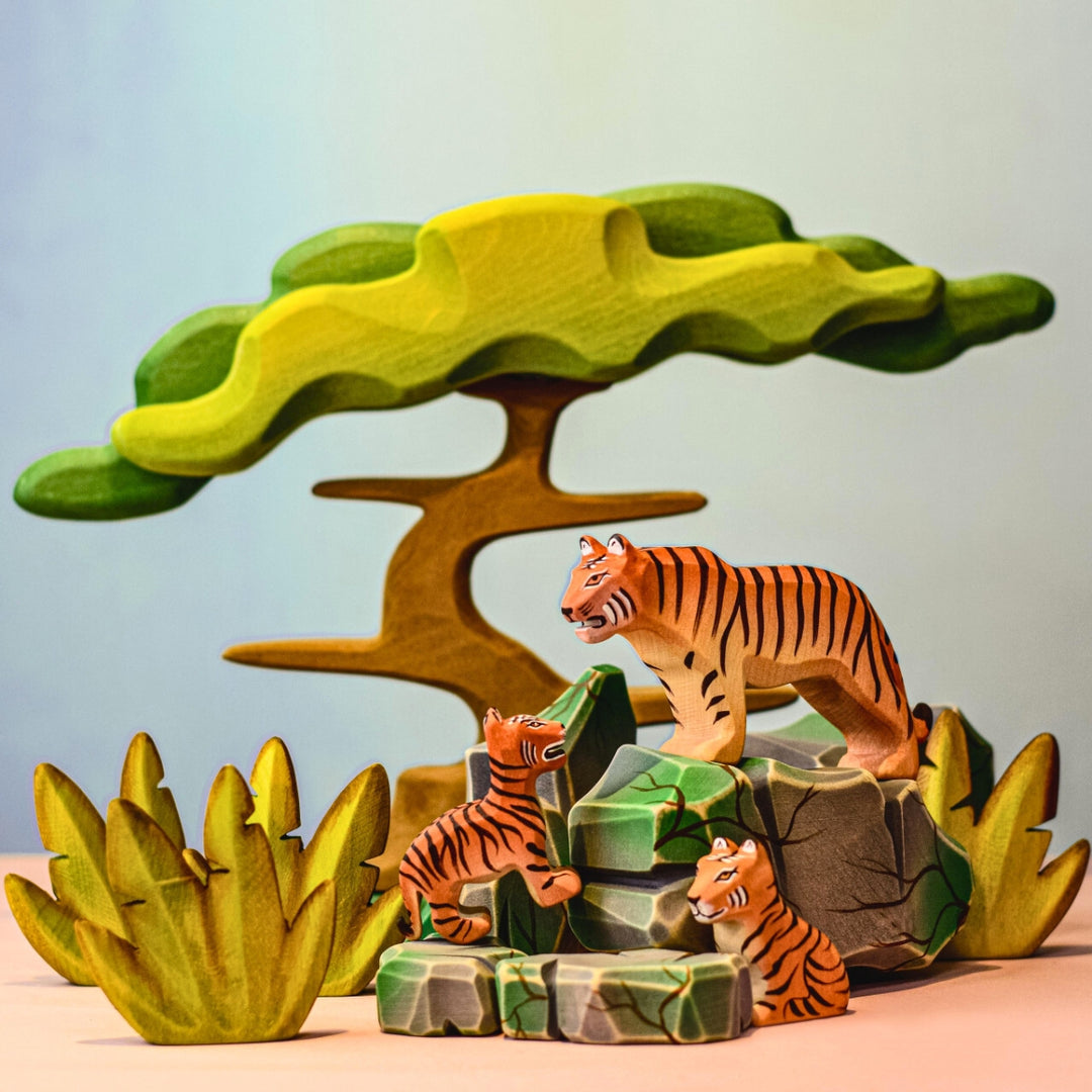 BumbuToys Handcrafted Wooden Animal Tiger from Australia in a small-world play setting