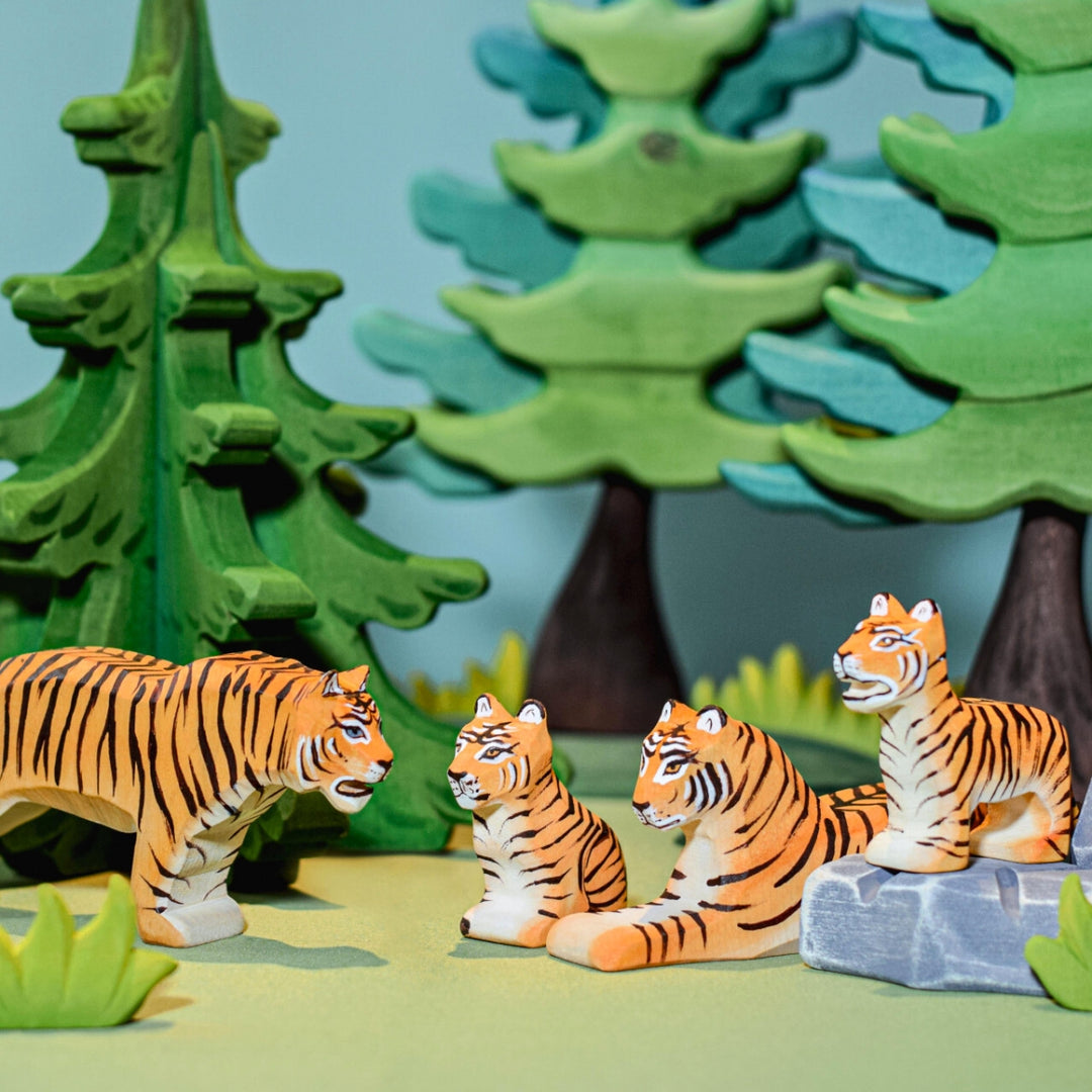 BumbuToys Handcrafted Wooden Animal Tiger Cub Standing from Australia in a small-world play setting