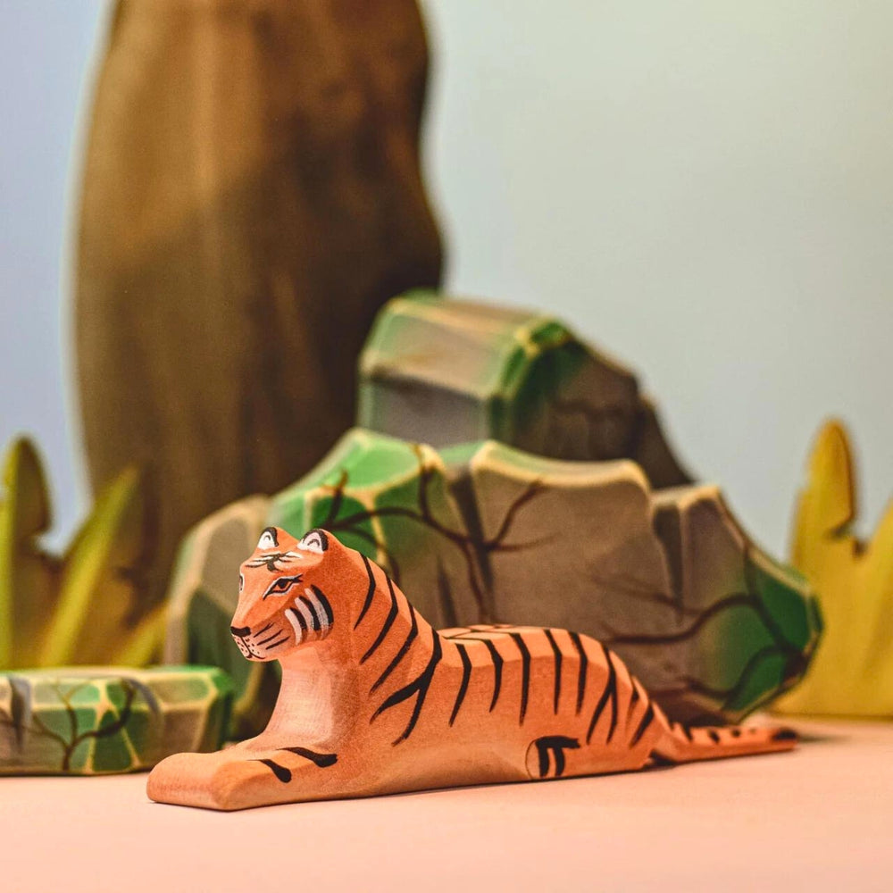 BumbuToys Handcrafted Wooden Animal Tiger Lying from Australia in a small-world play setting