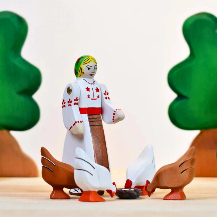 BumbuToys Handcrafted Wooden Bird Brown Chicken Hen from Australia in a small-world farm play setting