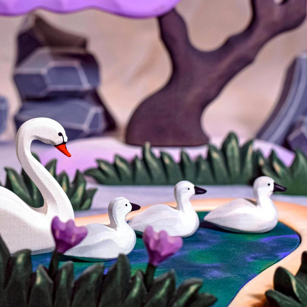 BumbuToys Handcrafted Wooden Bird Swans from Australia in a small-world play setting