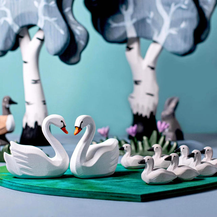 BumbuToys Handcrafted Wooden Bird Swans from Australia in a small-world play setting