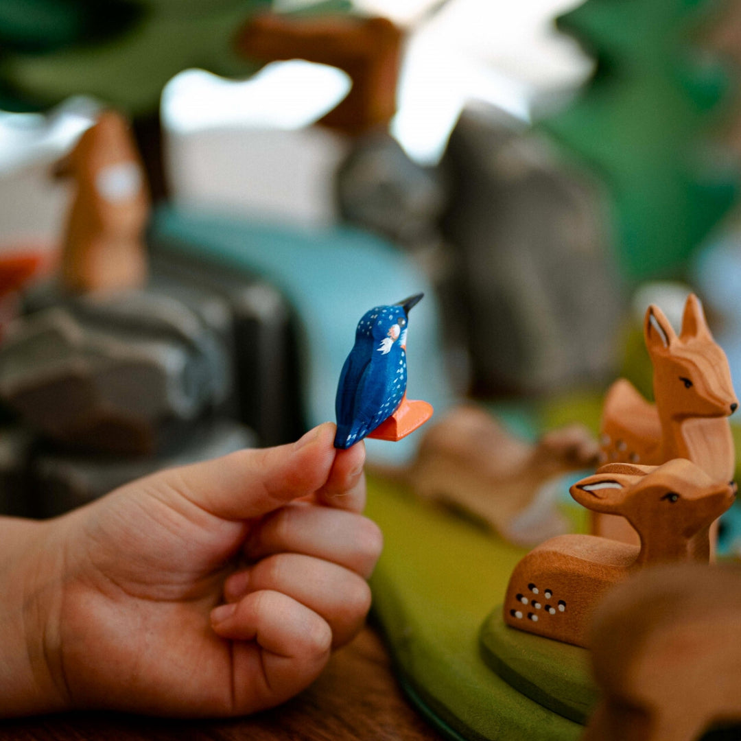 BumbuToys Handcrafted Wooden Bird Kingfisher from Australia in a small-world play setting