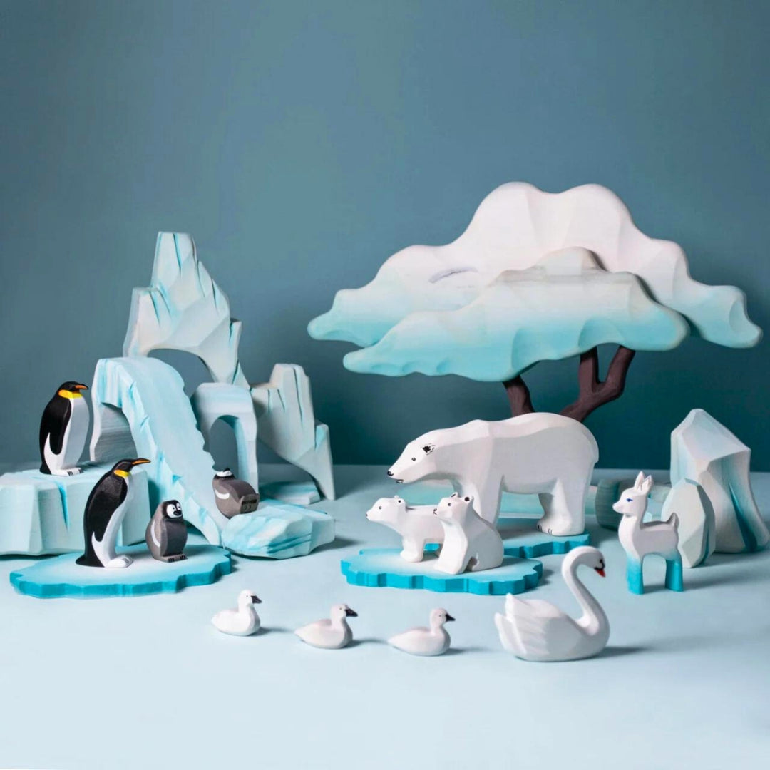 BumbuToys Handcrafted Wooden Bird Emperor Penguin Family Set from Australia in a small-world play setting