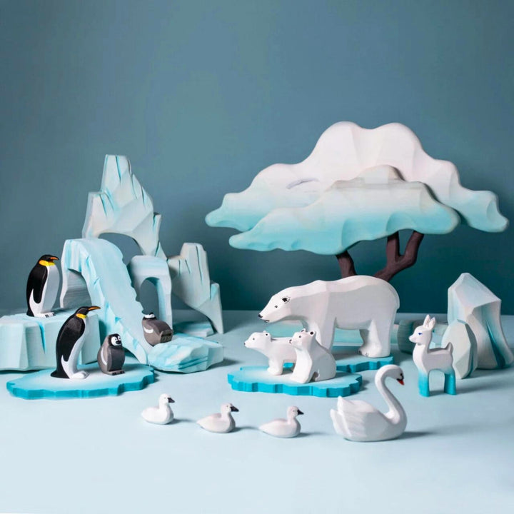 BumbuToys Handcrafted Wooden Bird Emperor Penguin Family Set from Australia in a small-world play setting