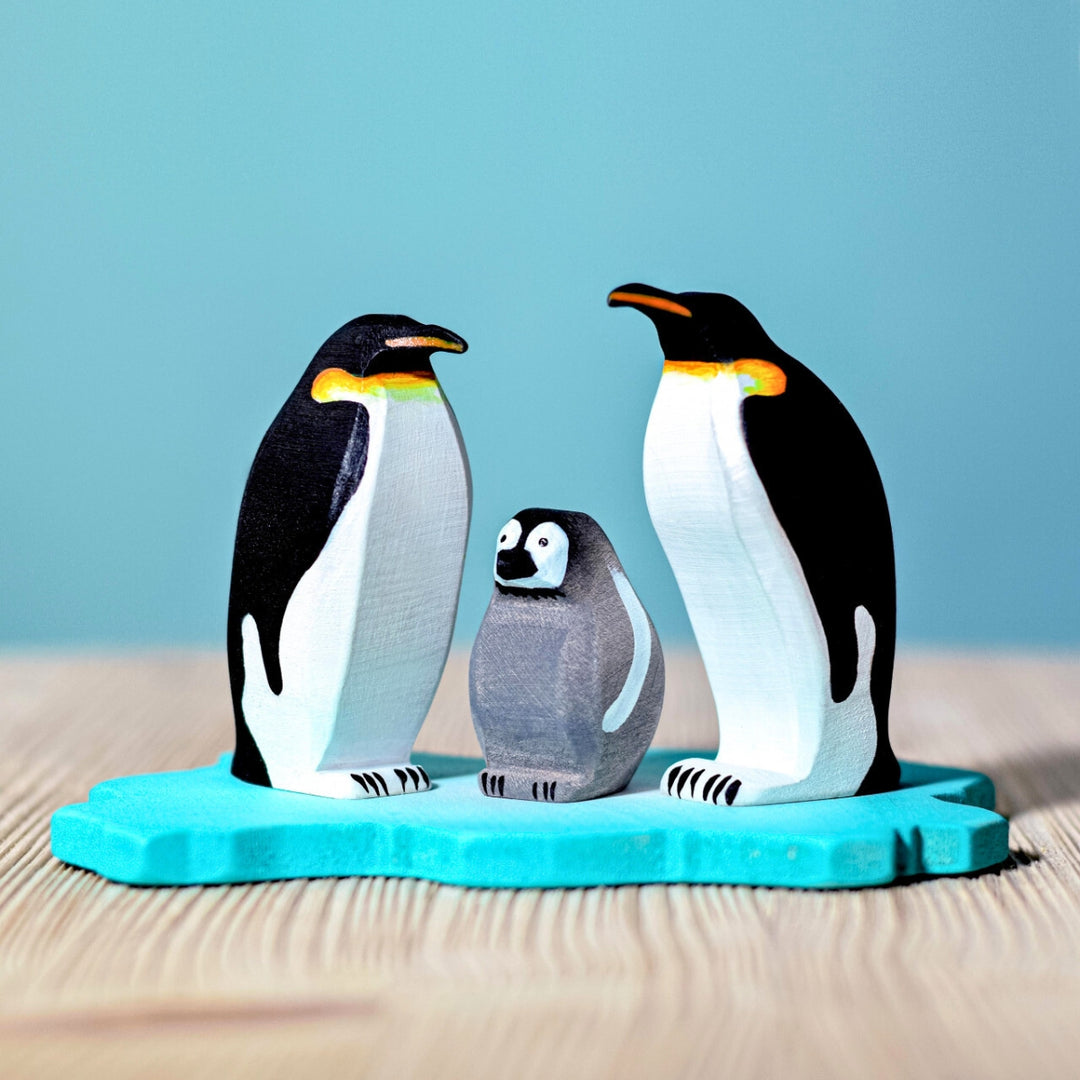 BumbuToys Handcrafted Wooden Bird Emperor Penguin Family Set from Australia in a small-world play setting