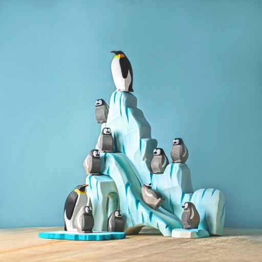 BumbuToys Handcrafted Wooden Bird Emperor Penguin Family Set from Australia in a small-world play setting