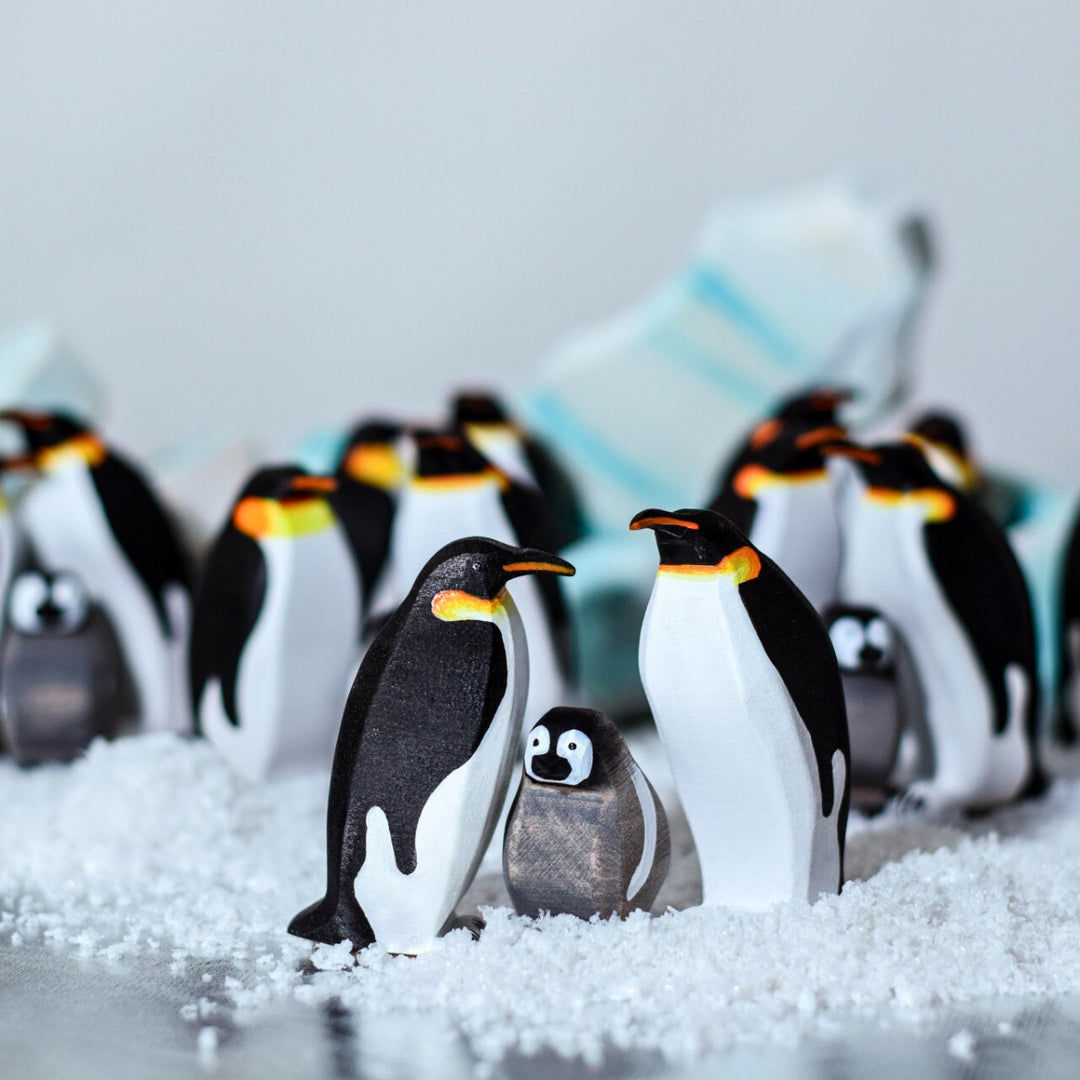 BumbuToys Handcrafted Wooden Bird Emperor Penguin Family Set from Australia in a small-world play setting