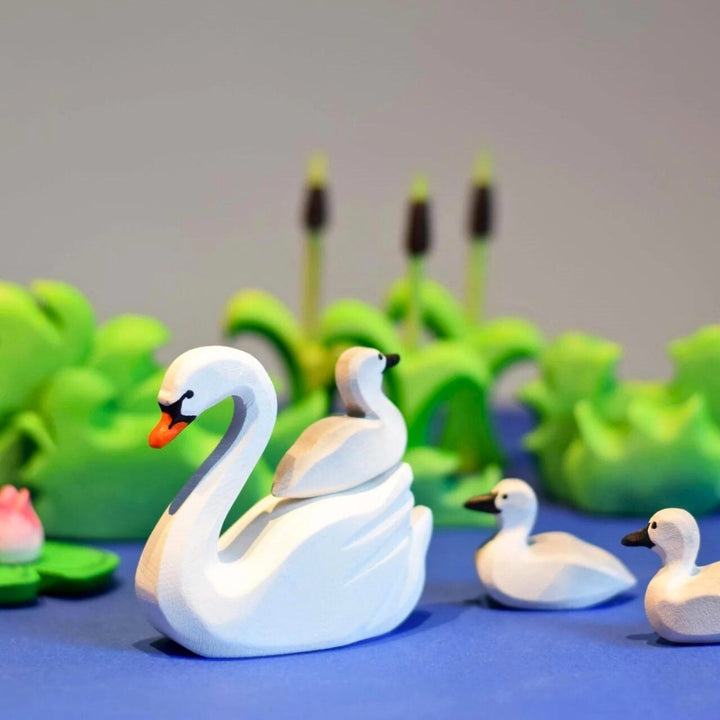 BumbuToys Handcrafted Wooden Bird Swans from Australia in a small-world play setting