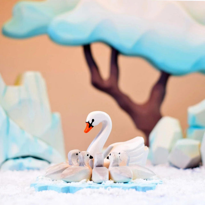 BumbuToys Handcrafted Wooden Bird Swans from Australia in a small-world play setting