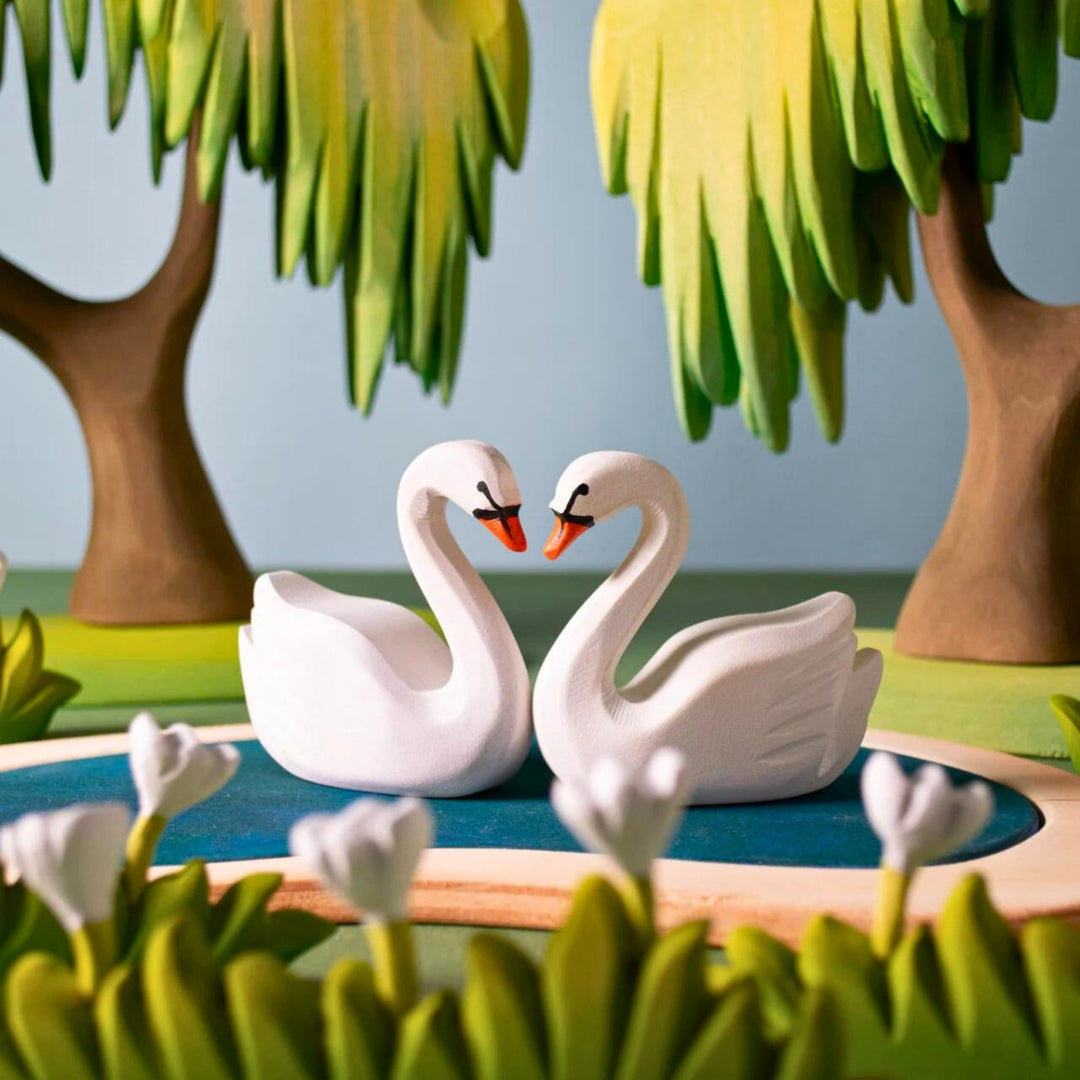 BumbuToys Handcrafted Wooden Bird Swans from Australia in a small-world play setting