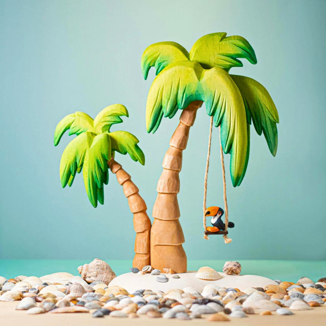BumbuToys Handcrafted Wooden Bird Baby Toucan from Australia in a small-world play setting