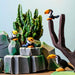 BumbuToys Handcrafted Wooden Bird Baby Toucan from Australia in a small-world play setting