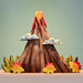BumbuToys Handcrafted Wooden Dinosaur Baby Stegosaurus from Australia in a small-world play setting
