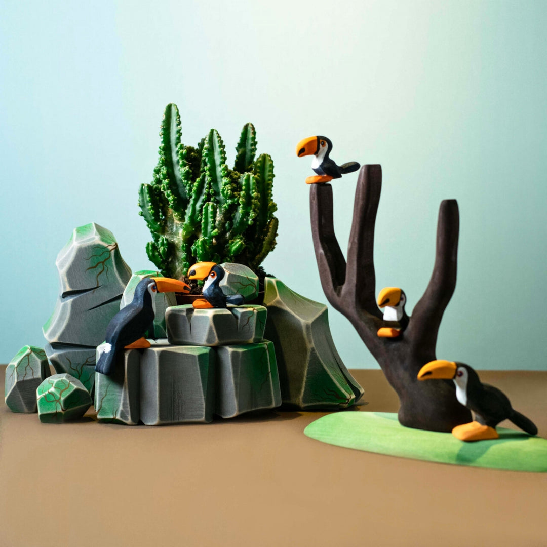 BumbuToys Handcrafted Wooden Landscape Mossy Rocks Set of 5 from Australia in a small-world play setting