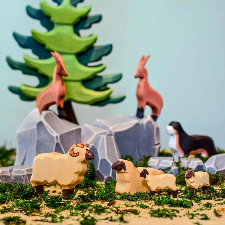 BumbuToys Handcrafted Wooden Landscape River Rocks from Australia in a small-world play setting