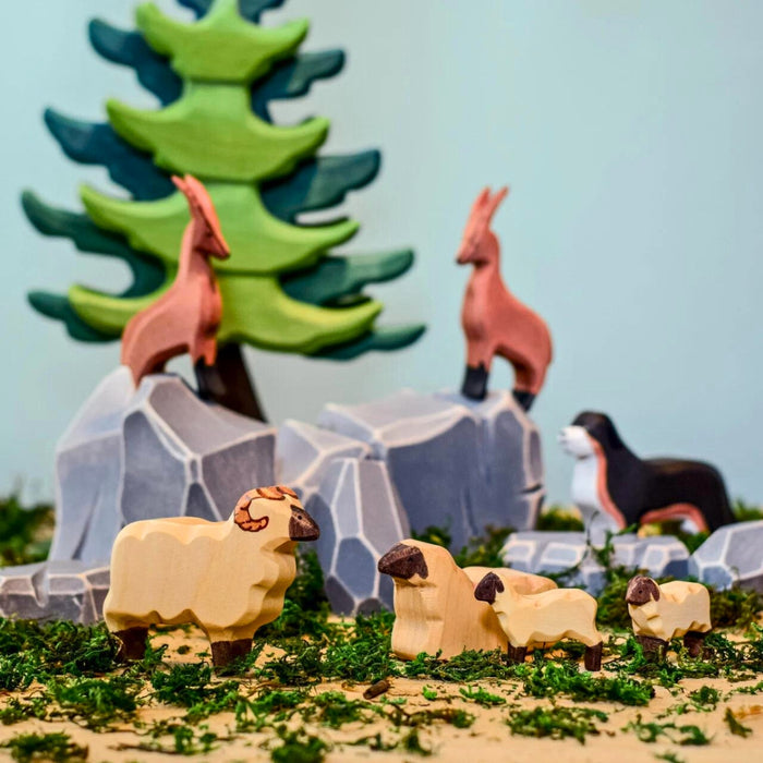 BumbuToys Handcrafted Wooden Landscape River Rocks from Australia in a small-world play setting