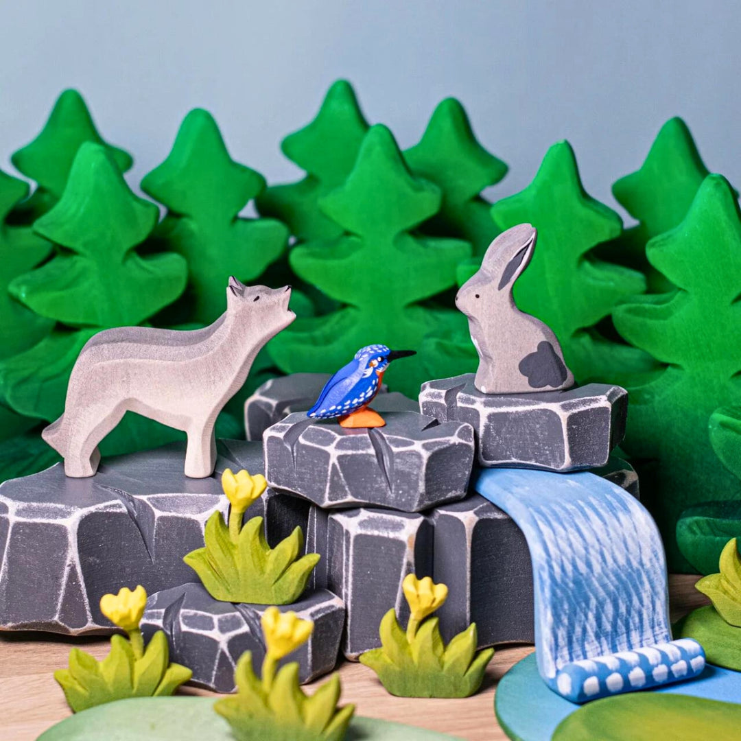 BumbuToys Handcrafted Wooden Landscape River Rocks from Australia in a small-world play setting