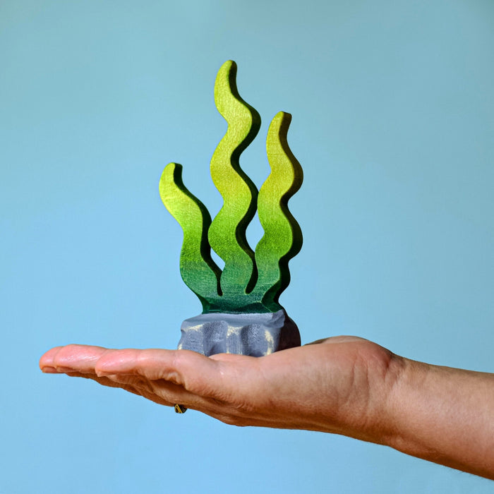 BumbuToys Handcrafted Wooden Figure Seaweed Sugar Kelp from Australia in a small-world play setting