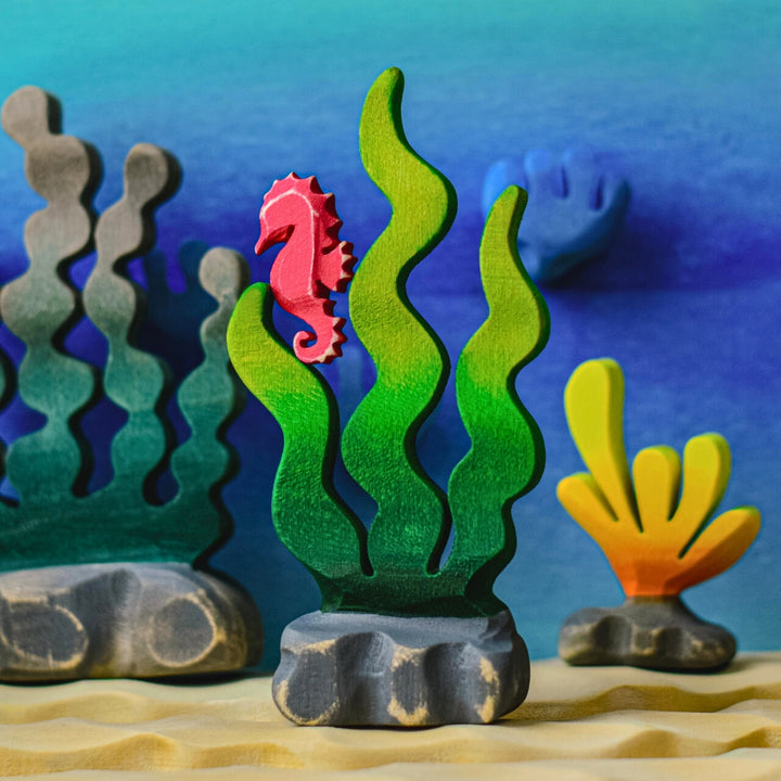BumbuToys Handcrafted Wooden Figure Seaweed Sugar Kelp from Australia in a small-world play setting