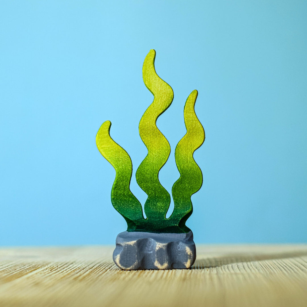 BumbuToys Handcrafted Wooden Figure Seaweed Sugar Kelp from Australia in a small-world play setting