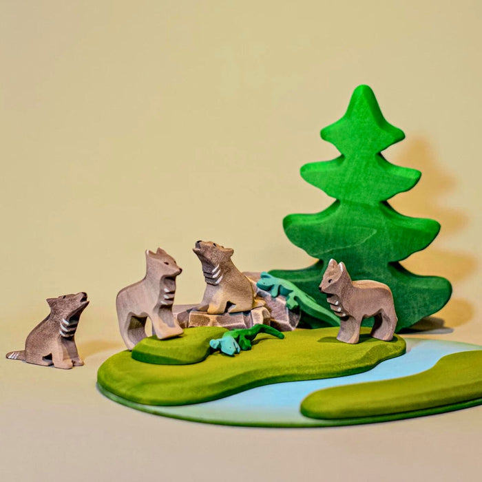 BumbuToys Handcrafted Wooden Tree Fir from Australia in a small-world play setting