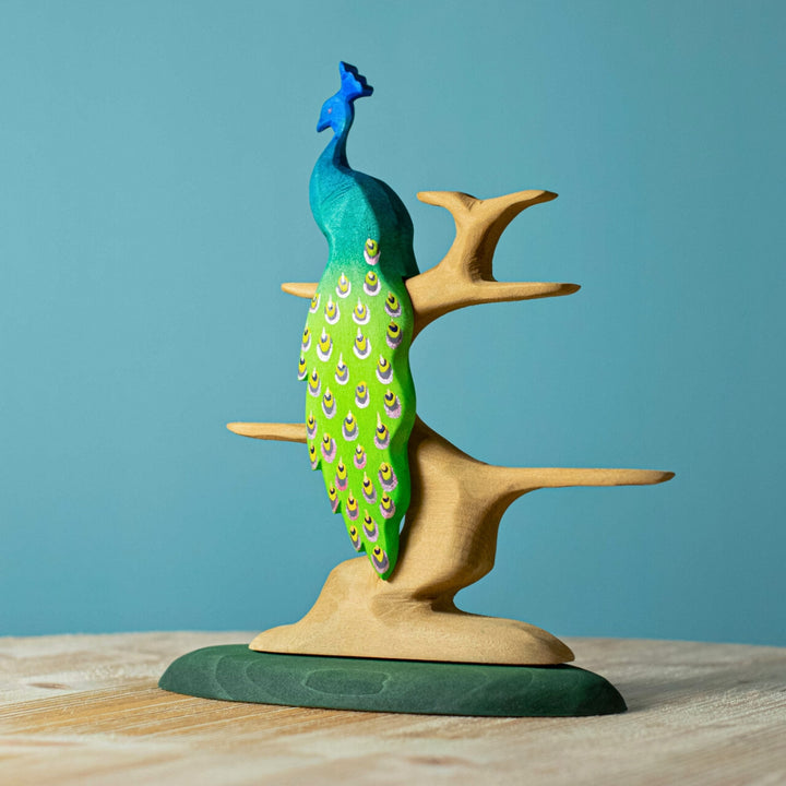 BumbuToys Handcrafted Wooden Tree Bird Perch from Australia in a small-world play setting