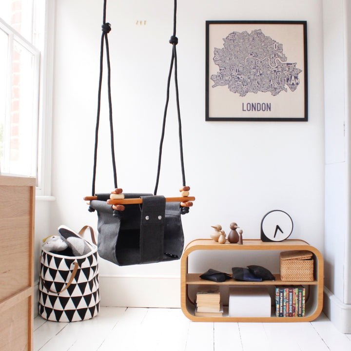 Smokey Grey SOLVEJ Convertible Baby & Toddler Swing hung indoors